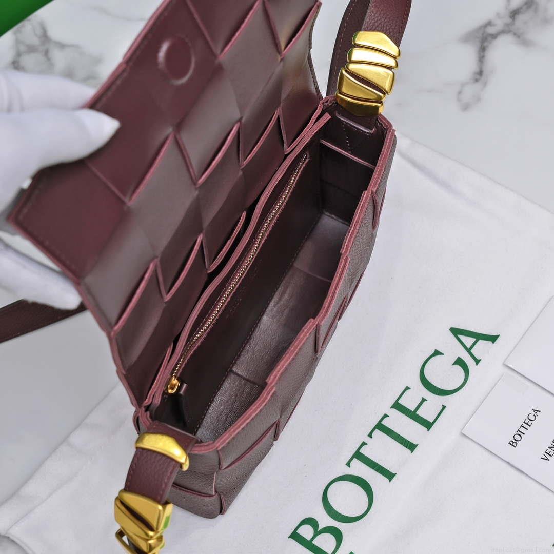 Bottega Veneta BV 666870 Cassette Intreccio grained leather cross-body bag Wine Red