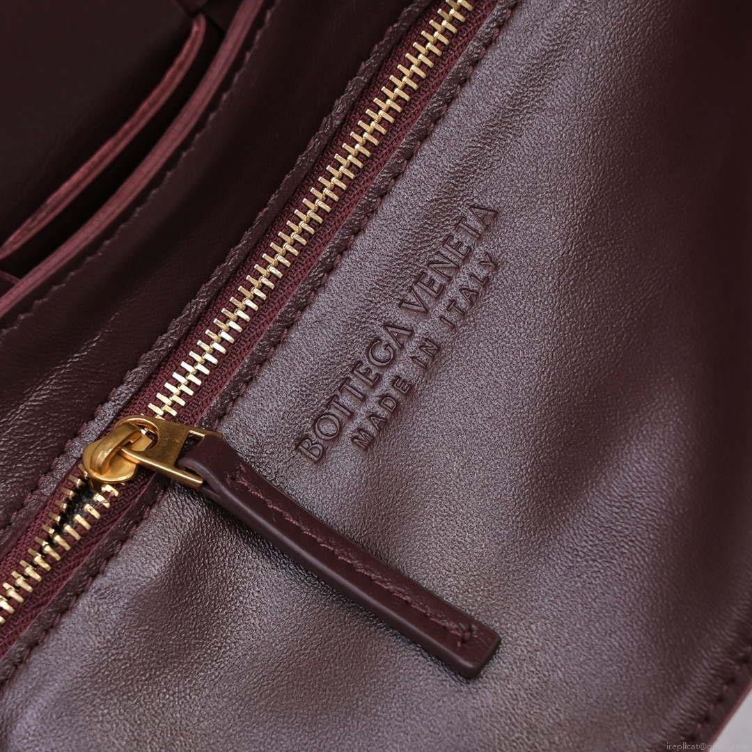 Bottega Veneta BV 666870 Cassette Intreccio grained leather cross-body bag Wine Red