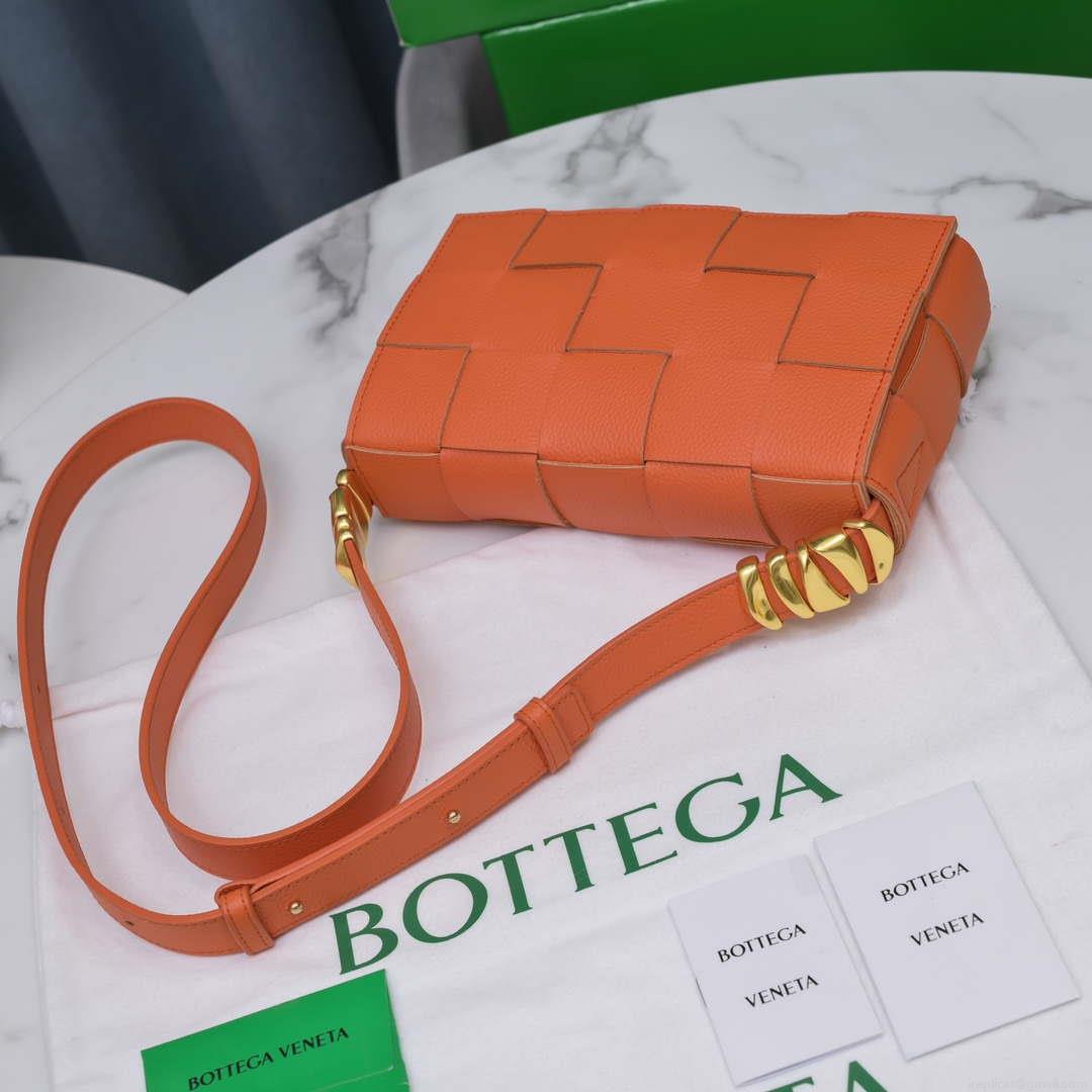 Bottega Veneta BV 666870 Cassette Intreccio grained leather cross-body bag Orange