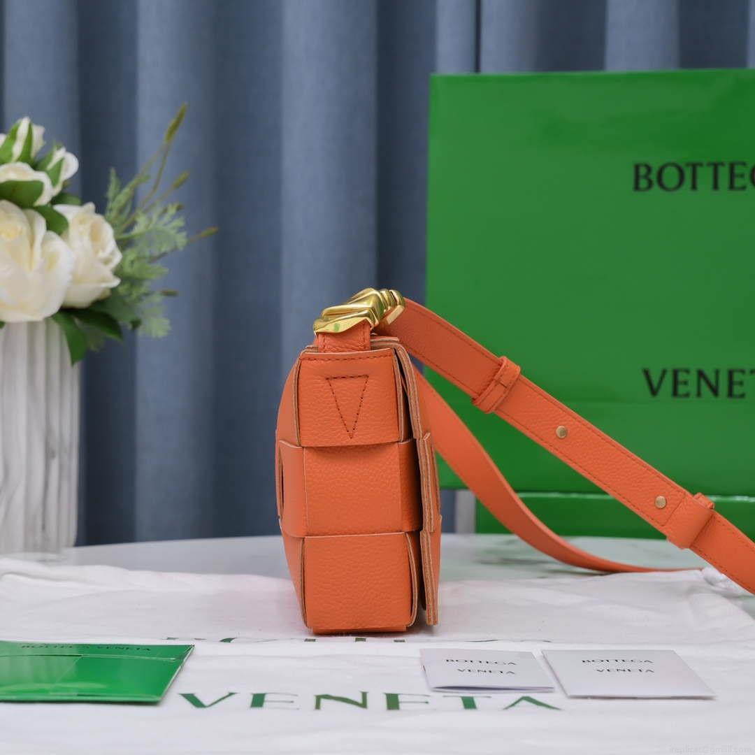 Bottega Veneta BV 666870 Cassette Intreccio grained leather cross-body bag Orange