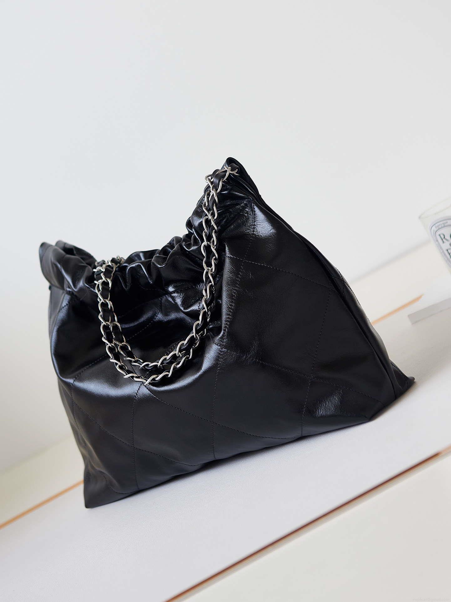 Chanel 22 Bag AS4486 Small Handbag Shiny Calfskin Black With Silver