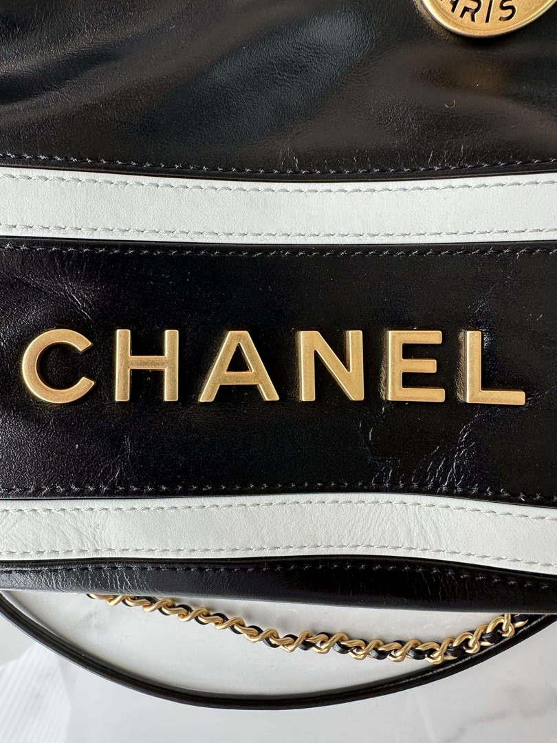 Chanel 22 Mini Handbag AS3980 Shiny Calfskin & Gold-Tone Metal Black & White