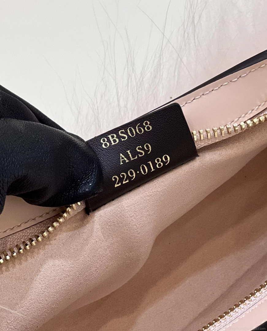Fendi 8BS068ALS9F1IVT O’Lock Swing Pale pink leather and fox fur pouch 8573