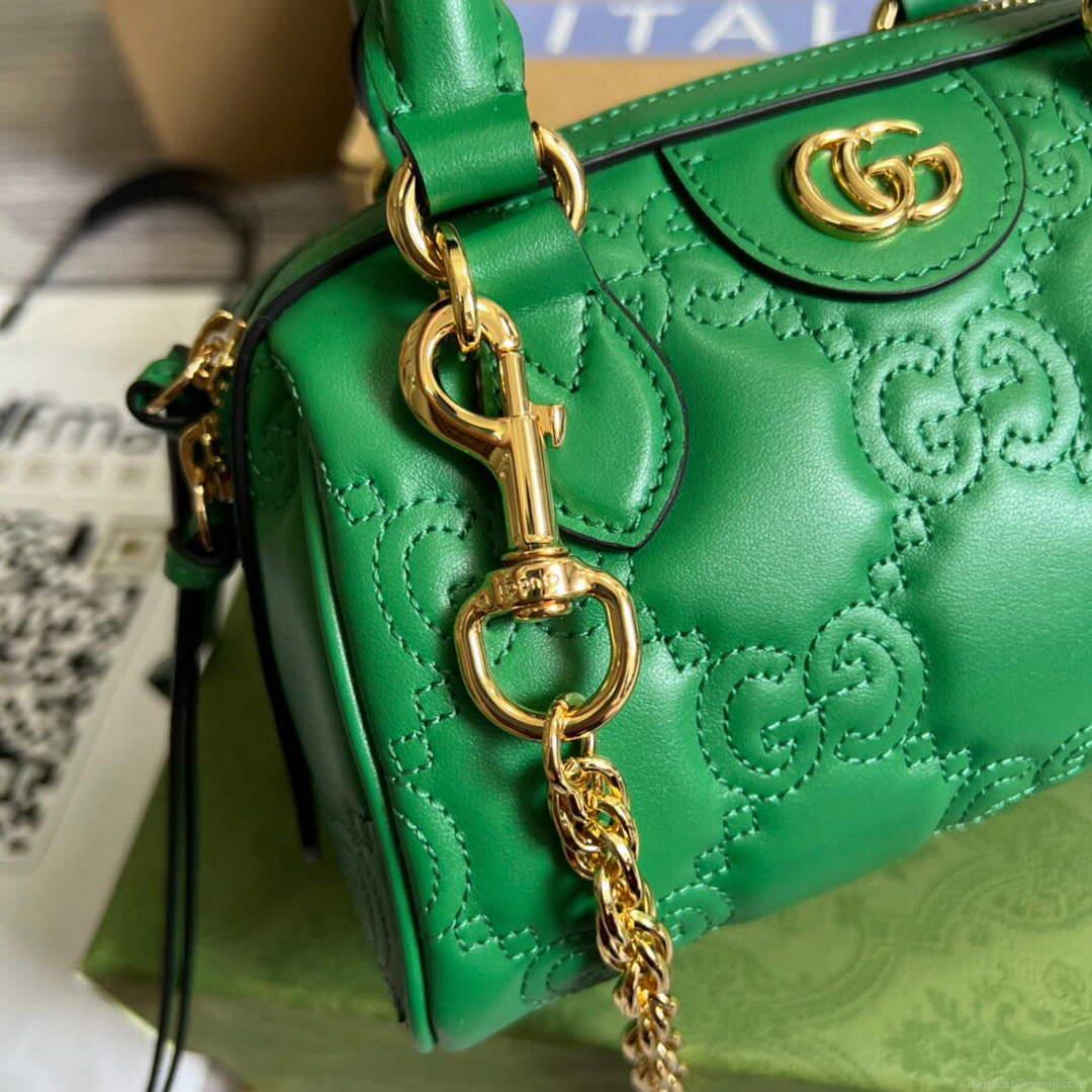 Gucci 702251 GG matelassé leather top handle bag Bright green