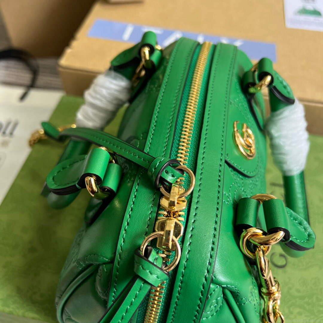 Gucci 702251 GG matelassé leather top handle bag Bright green