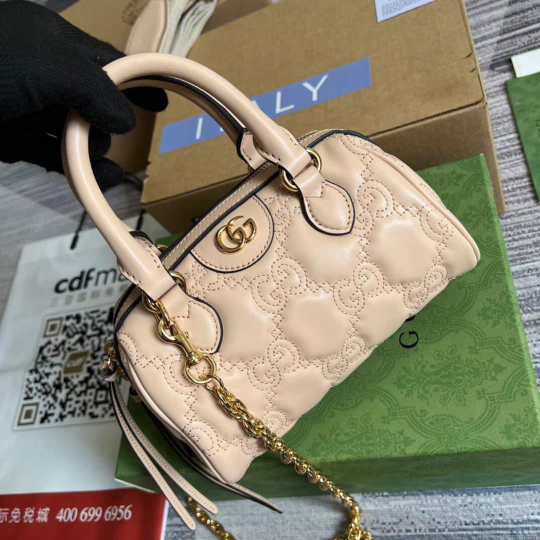 Gucci 702251 GG matelassé leather top handle bag Beige