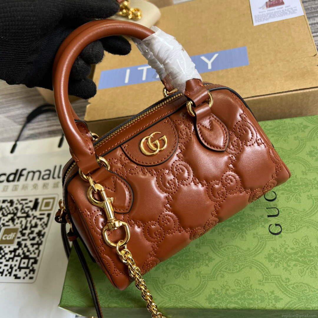 Gucci 702251 GG matelassé leather top handle bag Brown