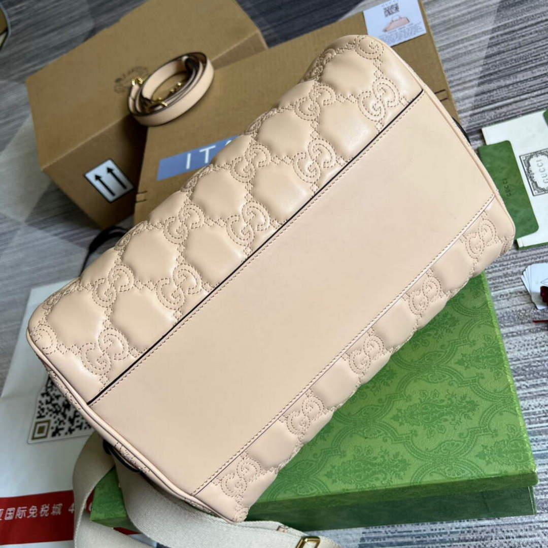 Gucci 702242 GG matelassé leather shoulder bag Beige