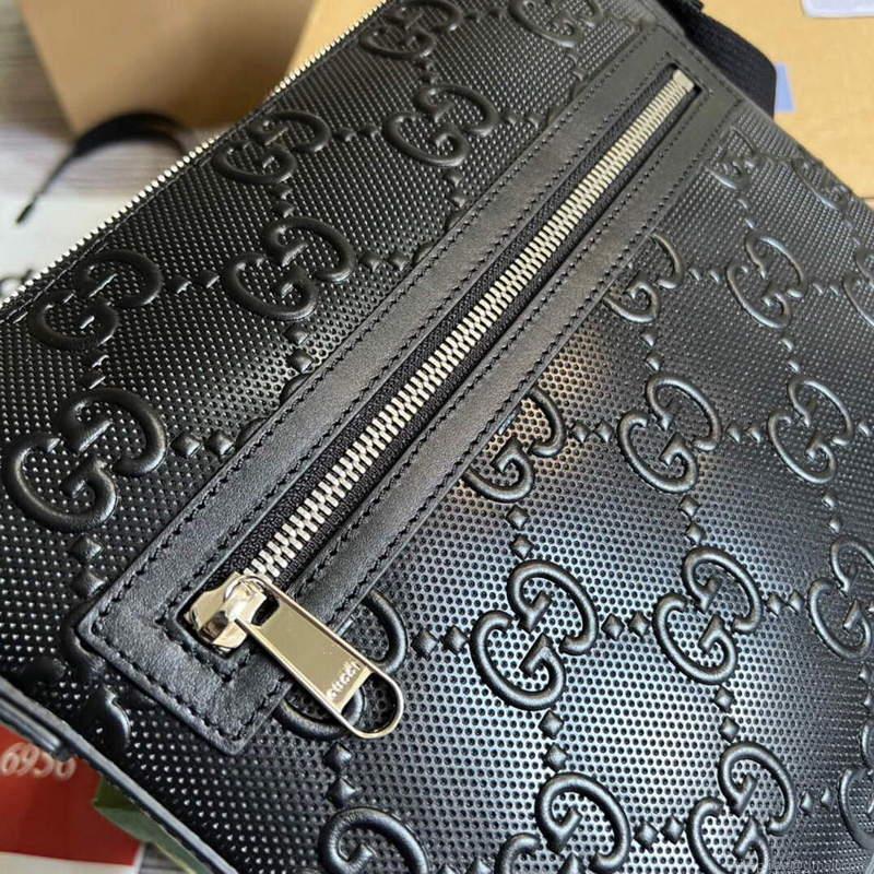 Gucci 406410 GG embossed small messenger bag Black