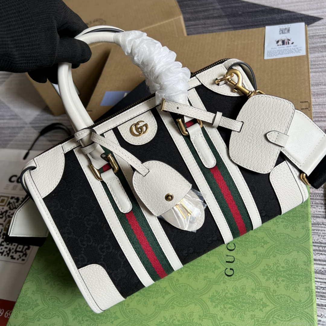 Gucci 715772 Small canvas top handle bag White and Black