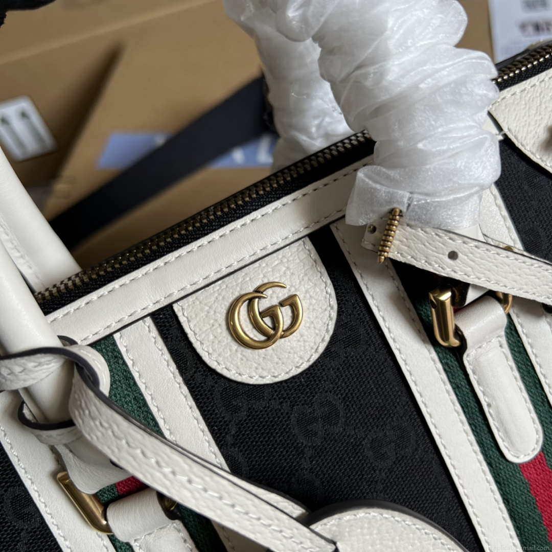 Gucci 715772 Small canvas top handle bag White and Black