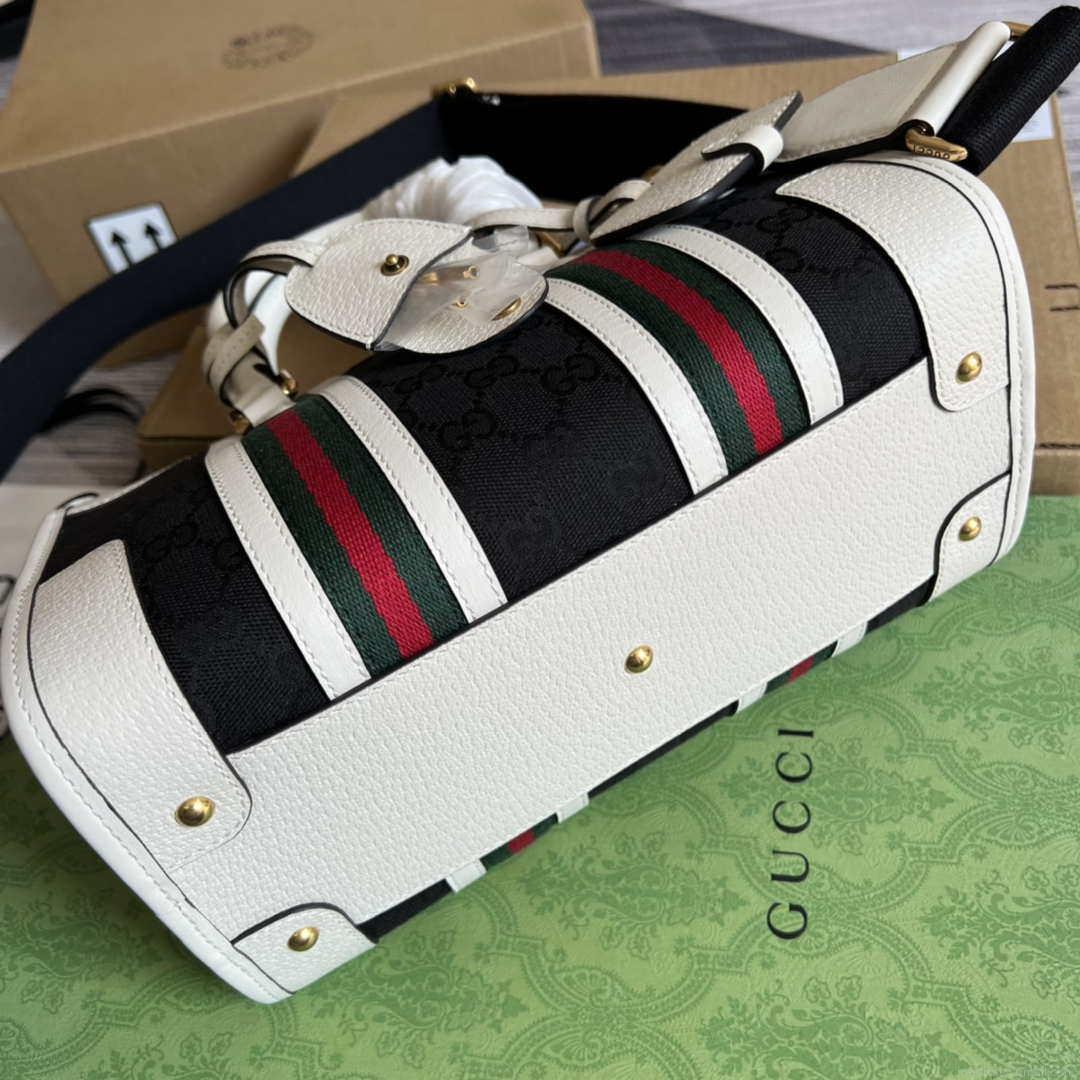 Gucci 715772 Small canvas top handle bag White and Black