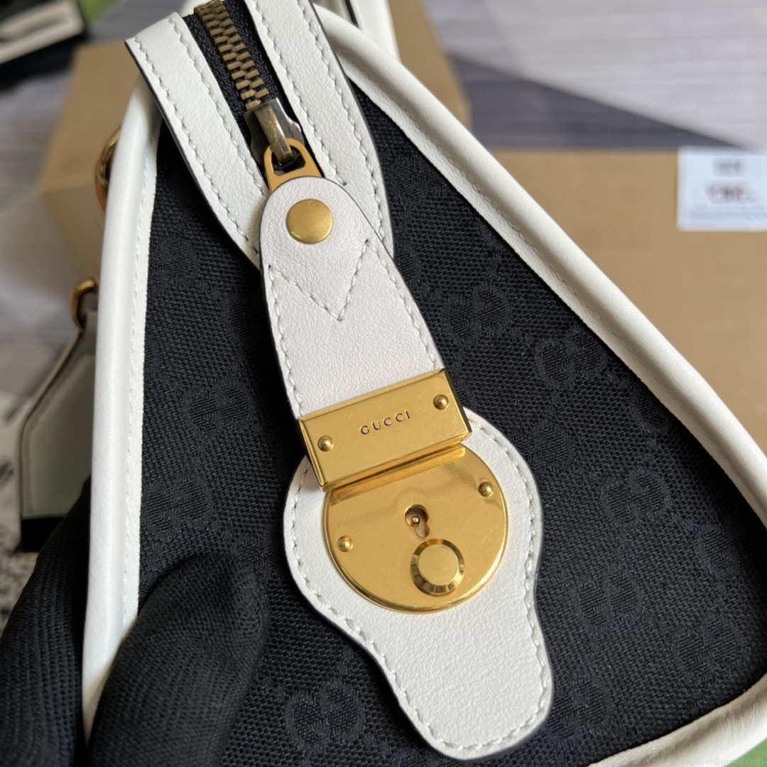 Gucci 715772 Small canvas top handle bag White and Black