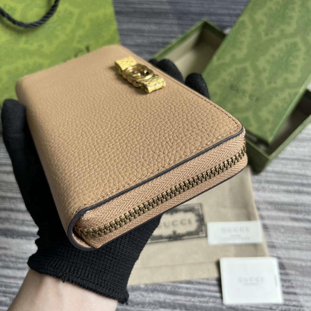 Gucci 750458 Zip wallet with Interlocking G python bow Rose beige
