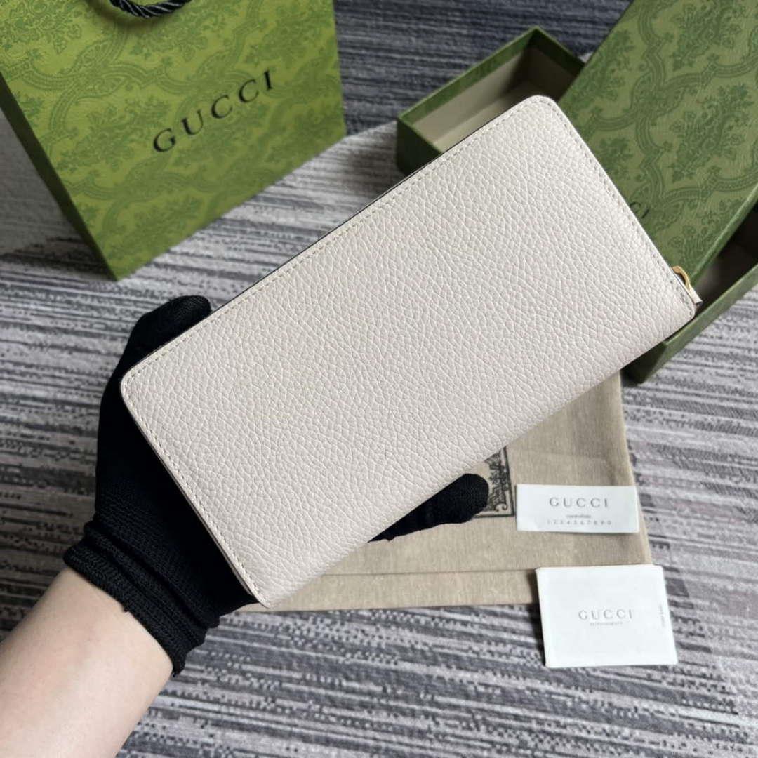 Gucci 750458 Zip wallet with Interlocking G python bow White