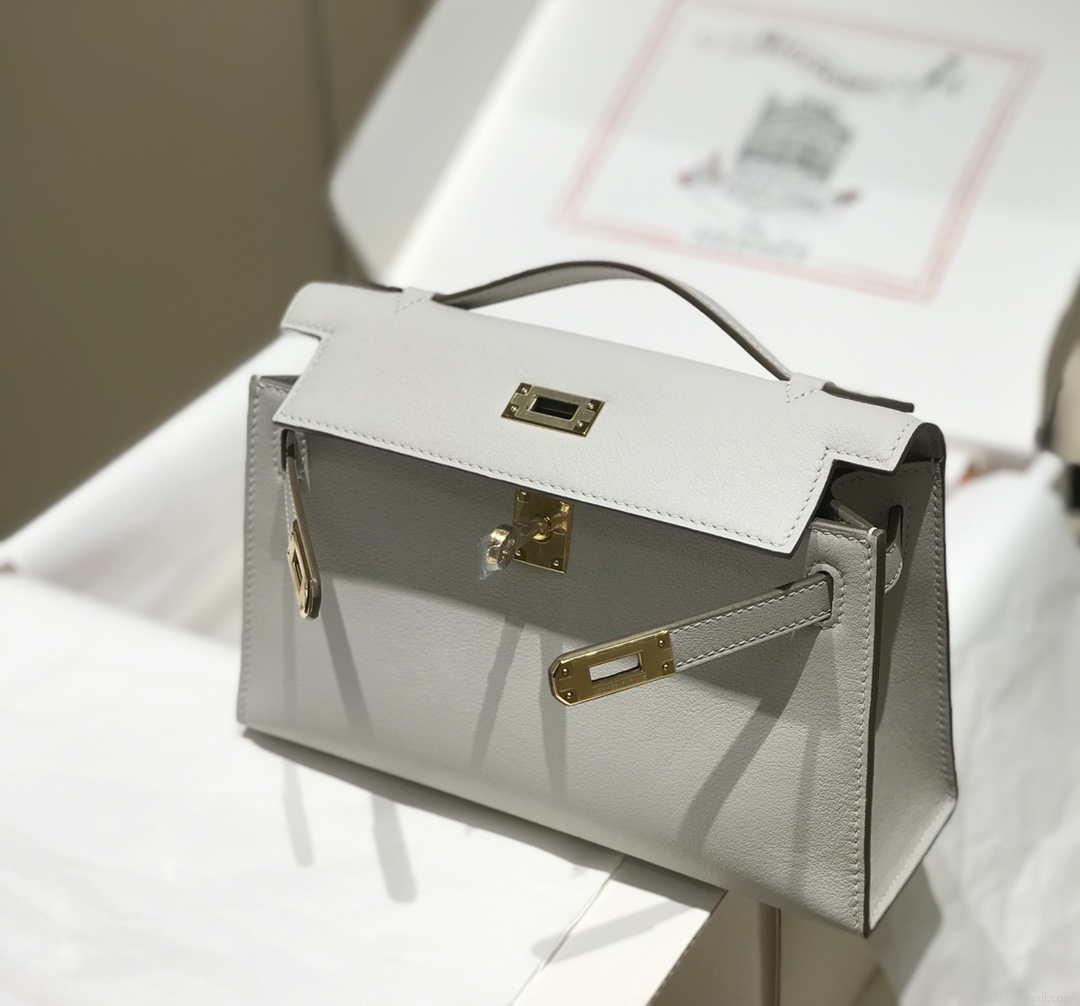 Hermes Kelly Pouchette Swift Leather clutch bag Gold H230271