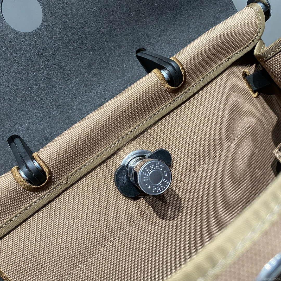 Hermes H084076CKAD A Dos Zip Retourne Herbag Backpack Toile Vache Hunter Ebene H60067