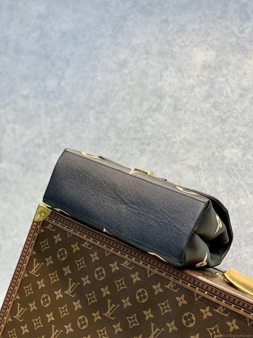 LV M45978 Louis Vuitton Madeleine MM Bicolor Monogram Empreinte Leather Black