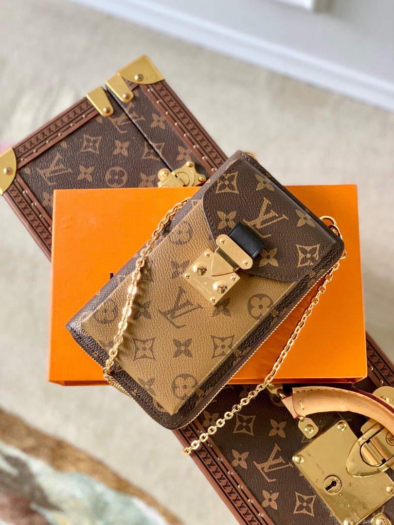LV M63913 Louis Vuitton Vertical Trunk Pochette Bag