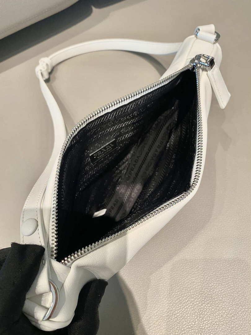 Prada 1NQ043 Triangle leather pouch White