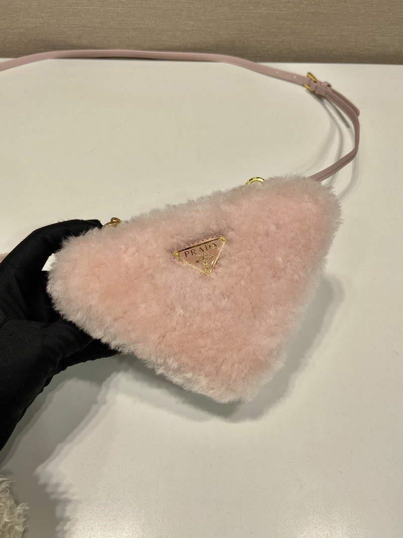 Prada 1NR015 Shearling and Saffiano leather mini-pouch Orchid pink