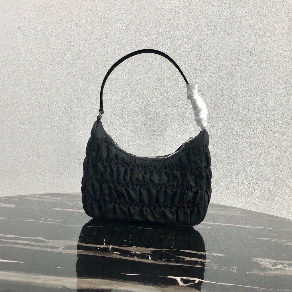 Prada 1NE204 Prada Nylon and Saffiano Leather Mini Bag in Black