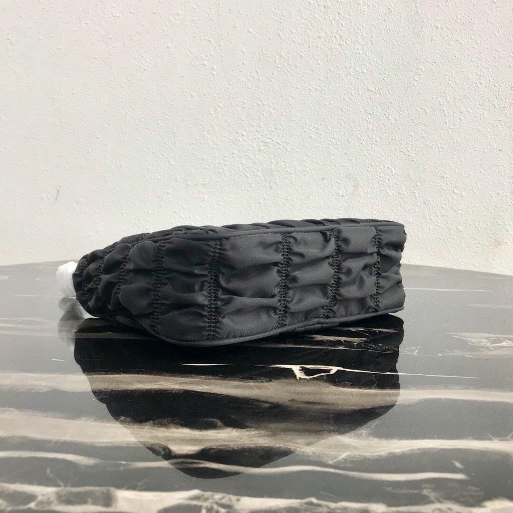 Prada 1NE204 Prada Nylon and Saffiano Leather Mini Bag in Black