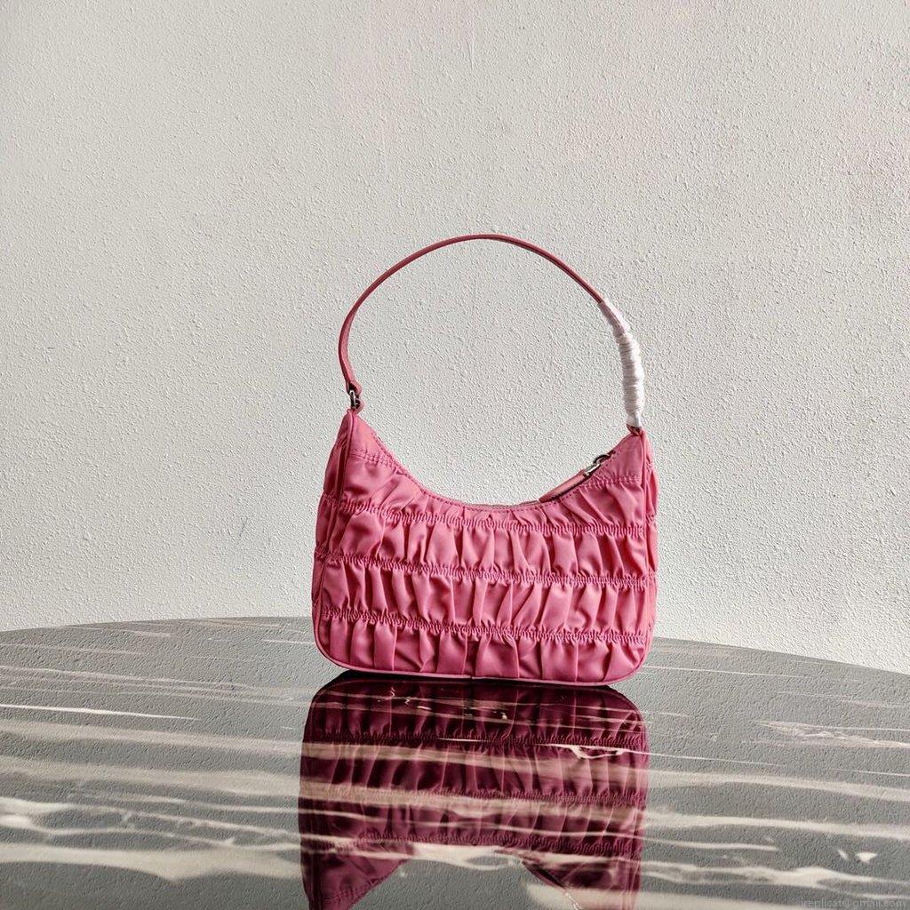 Prada 1NE204 Prada Nylon and Saffiano Leather Mini Bag in Pink