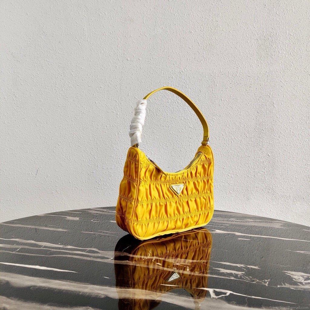 Prada 1NE204 Prada Nylon and Saffiano Leather Mini Bag in Yellow