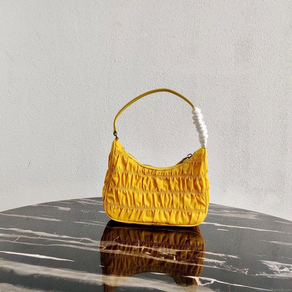 Prada 1NE204 Prada Nylon and Saffiano Leather Mini Bag in Yellow