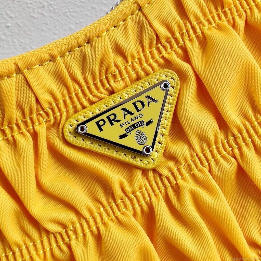 Prada 1NE204 Prada Nylon and Saffiano Leather Mini Bag in Yellow