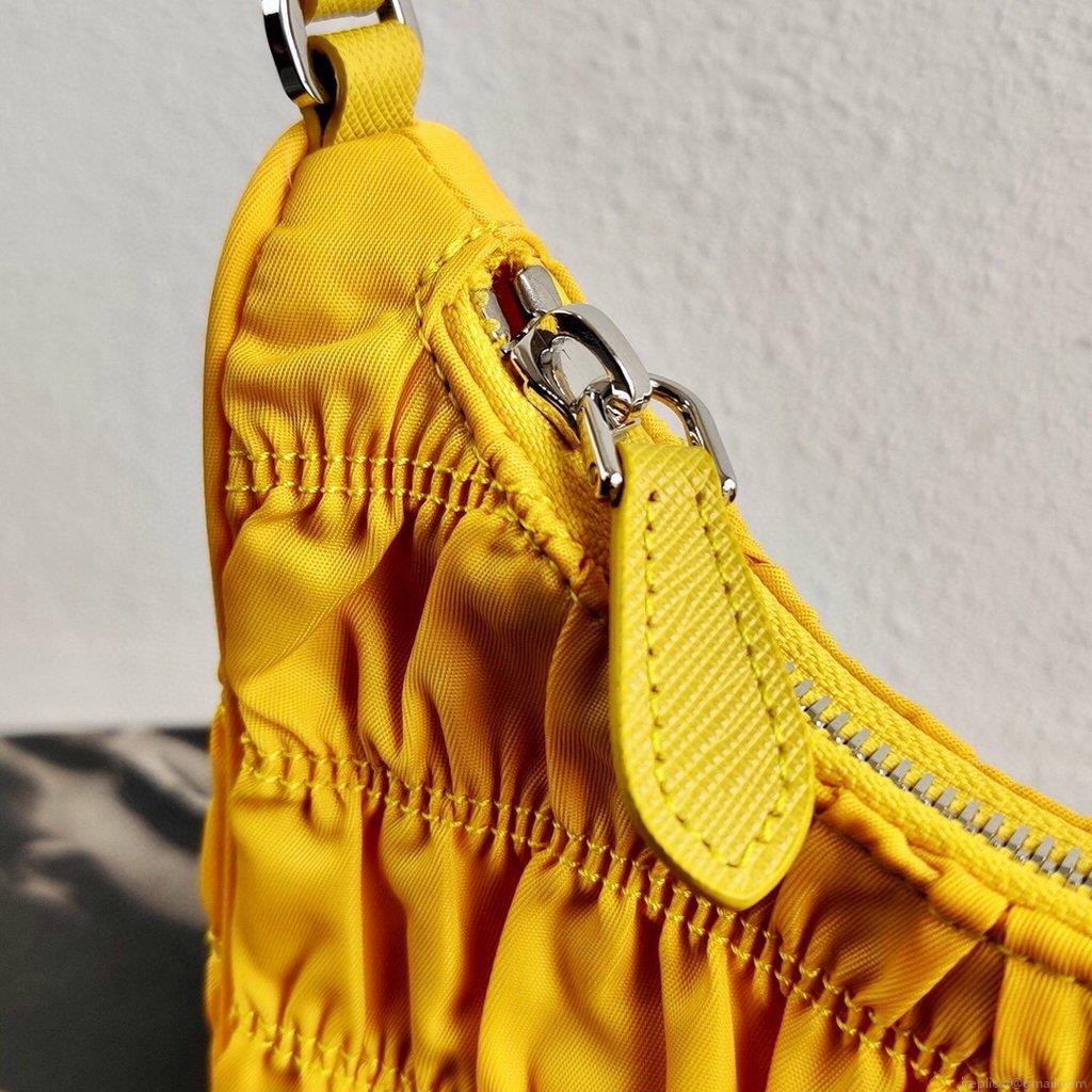 Prada 1NE204 Prada Nylon and Saffiano Leather Mini Bag in Yellow