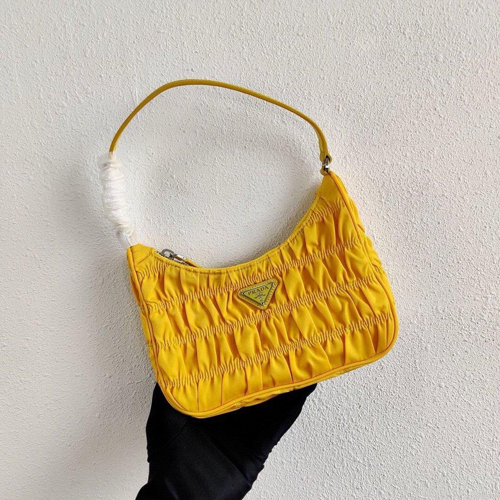 Prada 1NE204 Prada Nylon and Saffiano Leather Mini Bag in Yellow