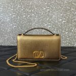 Valentino Garavani Vring Leather Bag 068 Gold